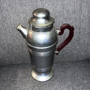 Mid century era, Art Deco style cocktail, shaker chrome, and ruby, red handle
